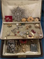 Small jewelry box full of Pins earrings bracelet