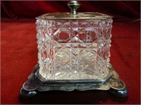 Silverplate glass jelly/sugar lidded container.