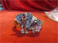 Very nice jeweled elephant clamper bracelet.