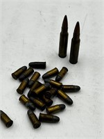 21 .32 ammunition & 2 308 bullets