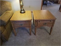 Two oak end tables with laminate top and drawer