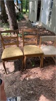 3 chairs, 2 wood dining table chairs with palm