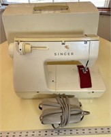 Vintage singer sewing machine with case and foot