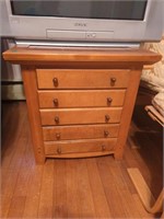 Wooden side table with three drawers