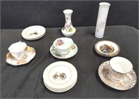 Group of tea cups, small plates, miniature vases