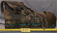 47B: Diver’s boot, weighs about 20 lb.