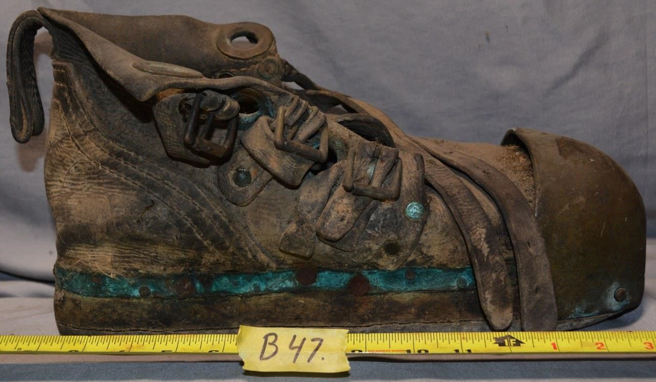 47B: Diver’s boot, weighs about 20 lb.