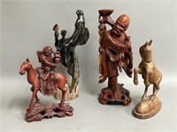 Four Diminutive Carved Figurines