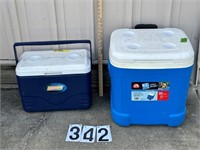 2 Blue coolers 1 is on wheels