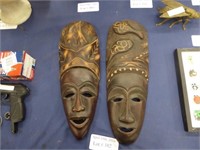 TWO CARVED TRIBAL MASKS 20" TALL.