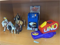 Lot of toy horses, express mail mailbox bank,