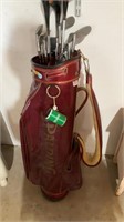 Spalding  golf bag and various clubs