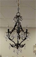 Metal chandelier with leaf detailing