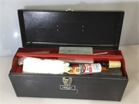 Metal toolbox with assorted gun cleaning