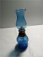 One vintage cobalt blue glass oil lantern.