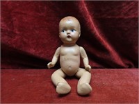 Small composite vintage baby doll.