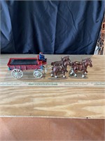 Cast iron four horse delivery wagon, description