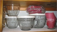 Shelf of Pamper Chef Mixing Bowls
