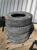 Four 11R22.5 semi tires