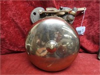 Old polished brass box fighting ring bell.