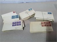 A large amount of first-day-of-issue envelopes