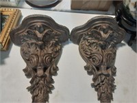 Pair of carved design wall shelves