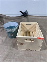 wooden crate with plastic planter
