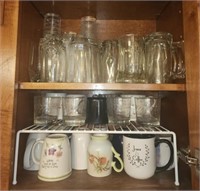 Cabinet lot of misc glass cups mugs and more