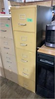 Yellow five drawer file cabinet, may have some
