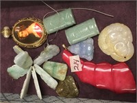 Assorted jade pendants and a pendant with a beauti
