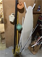 Pole lamp, ironing board, mops, etc.
