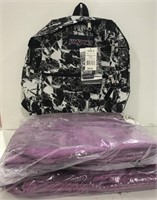 Jansport backpack and purple luggage pouches