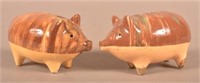 Two Mottle-Glazed Earthenware Pig-Form Still Banks