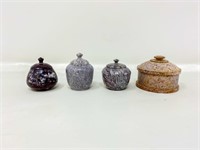 4 miniature lidded stone bowls