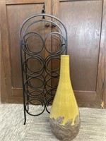 Green Pottery Vase. Metal Wine Rack