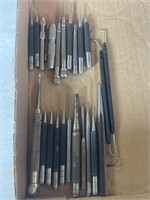 Various sized pin punches and scribe tools