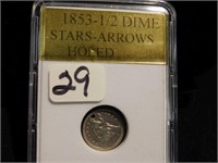 1853 - 1/2 Dime - has stars and arrows - has been