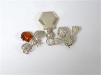 2 sterling silver bees, one w. amber body &