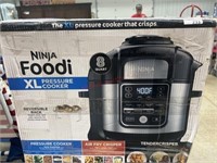 Ninja foodi pressure cooker.  Appears new