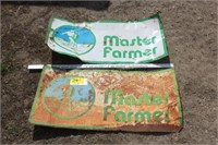 2 Vintage Master Farmer Tin Signs