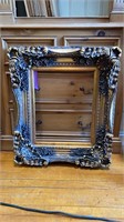 HEAVILY CARVED CONTEMPORARY FRAME