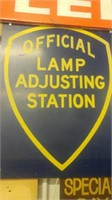 Official lamp adjusting station sign