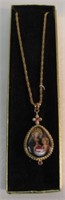 MARY & CHILD CEREMIC PENDANT ON 28" CHAIN. VERY