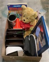 Box contains a nice stuffed teddy bear, an Omron
