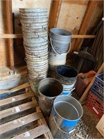lot of empty plastic pails (oil), 2 metal pails.)