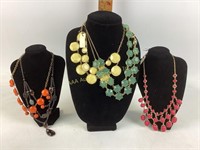 Costume jewelry- necklaces with tags.
