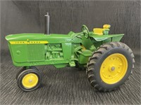 John Deere die-cast tractor.  Made in U.S.A.