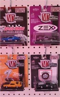 (4) M2 1/64 SCALE CARS ASSORTED