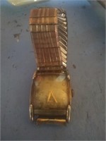 Vintage men's gold tone watch I cannot make out