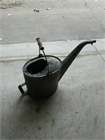 Very old galvanized large watering can. Please